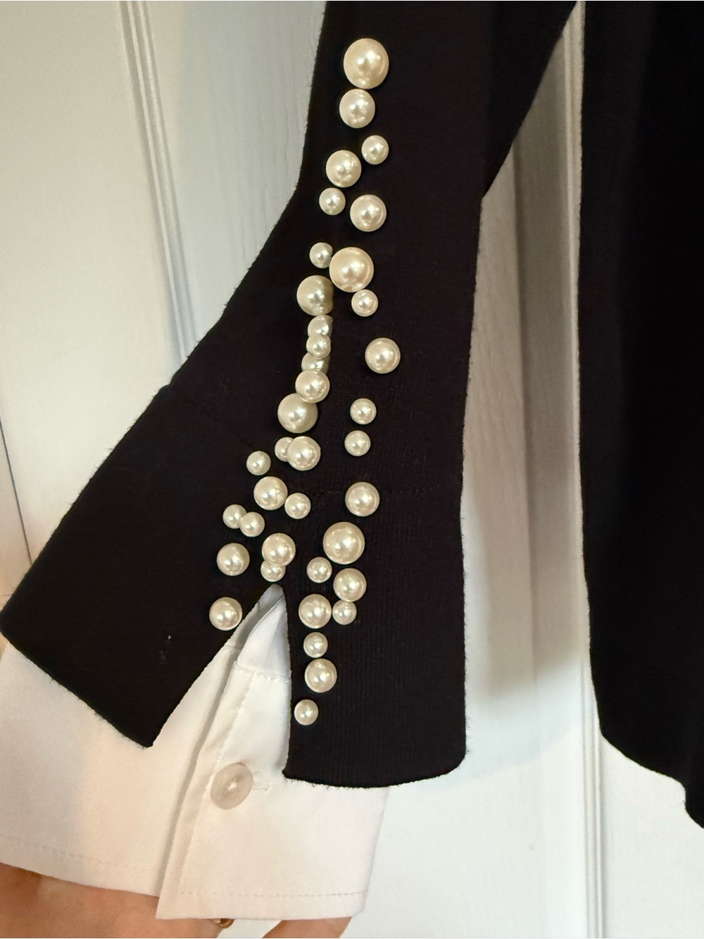 Chico's Black V-Neck Sweater with White Shirt Collar and Pearl Cuff Detail
